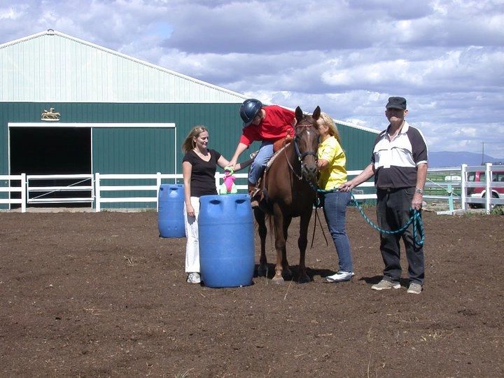 Barrel racing training with young rider on horseback